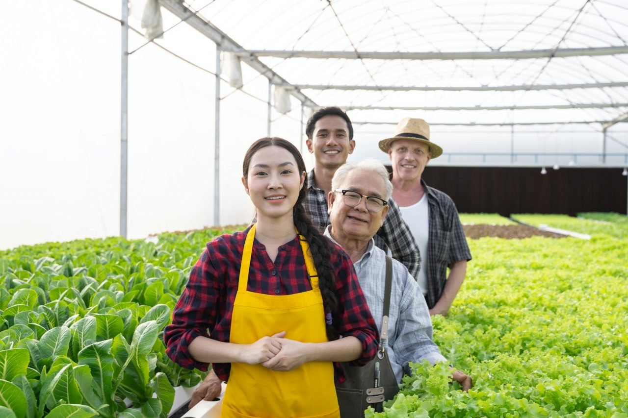 portrait-group-of-team-worker-organic-vegetables-hydroponics-farm.jpg